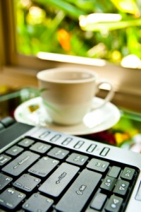 Coffee cup and notebook