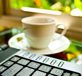 Coffee cup and notebook