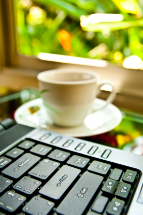 Coffee cup and notebook